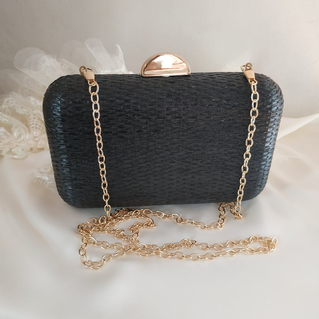 Bolso clutch negro y dorado