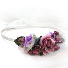 Cinturón de flores tonos grantes y lilas
